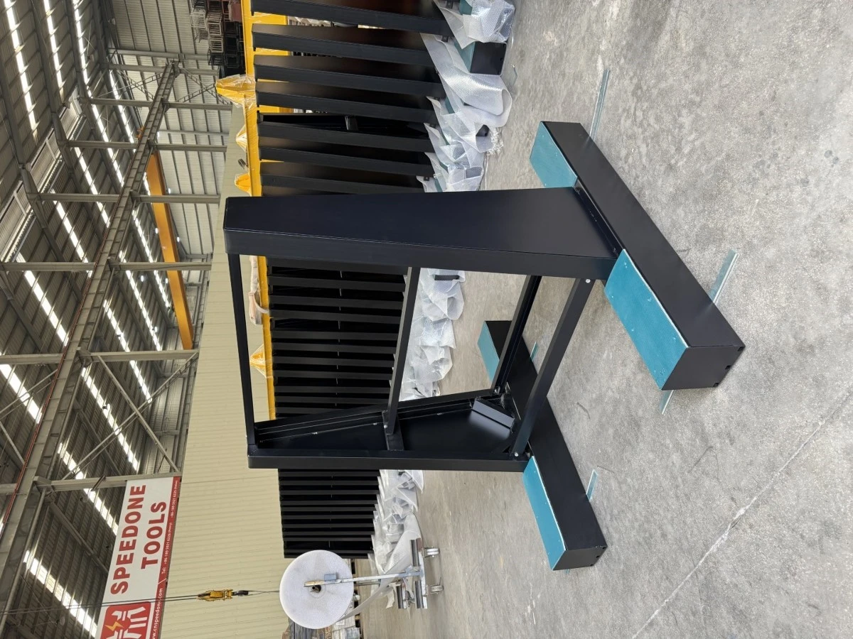 Black metal display rack designed to support and present large natural stone slabs in stone showroom Black metal display rack designed to support and present large natural stone slabs in stone showroom